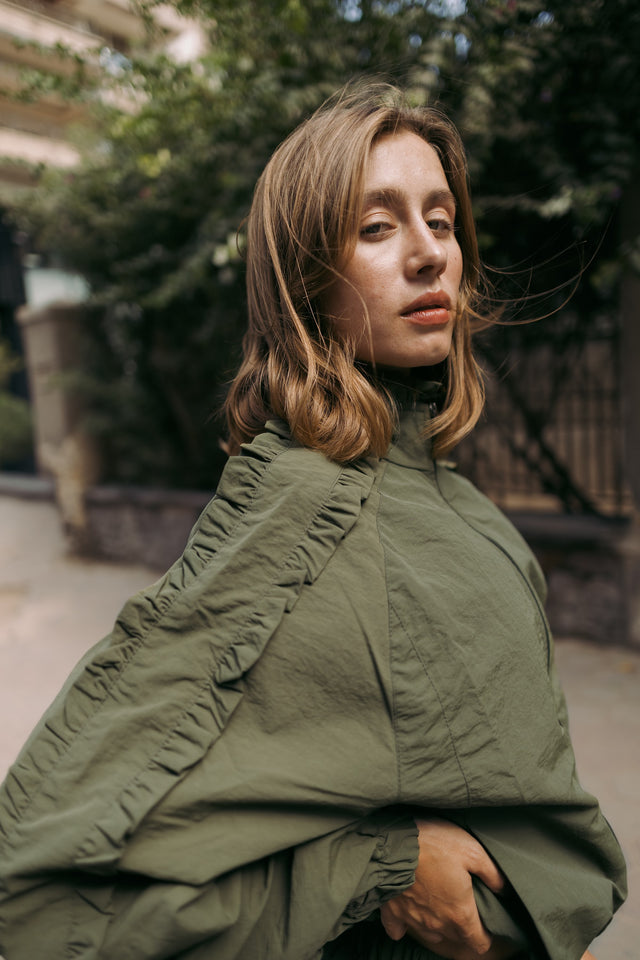Ruffle trim on the olive shoulder