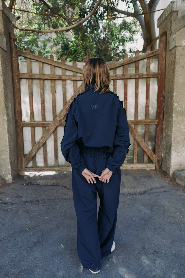 Navy track set from the back