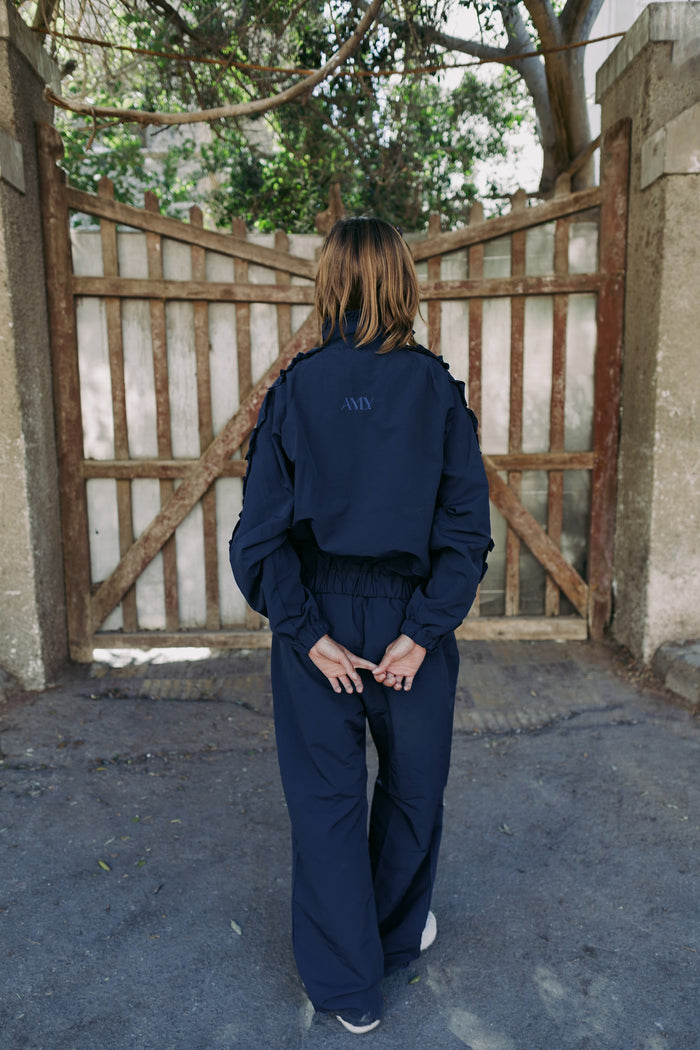 Navy track set from the back
