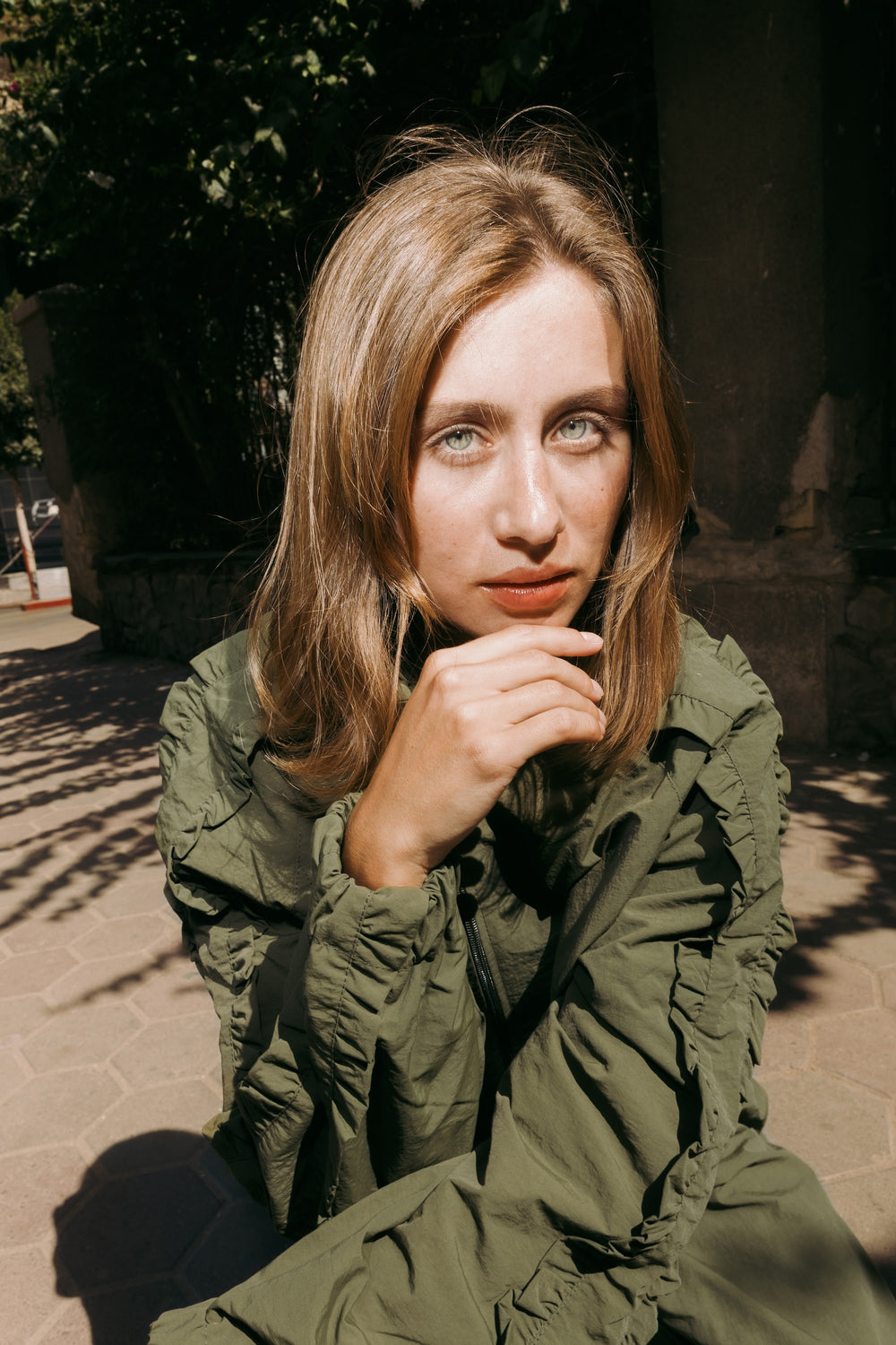 Close-up in the olive jacket
